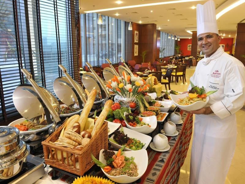 Marriott Executive Apartments Manama, Bahrain Eksteriør bilde A buffet at a hotel